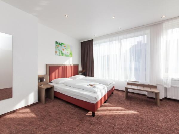 Hotel Excelsior Dortmund Hauptbahnhof : photo 3 de la chambre chambre triple standard