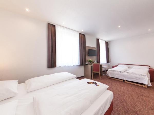 Hotel Excelsior Dortmund Hauptbahnhof : photo 7 de la chambre chambre double avec canapé-lit