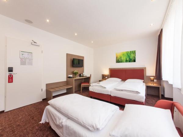 Hotel Excelsior Dortmund Hauptbahnhof : photo 2 de la chambre chambre double (1 adulte et 1 enfant)