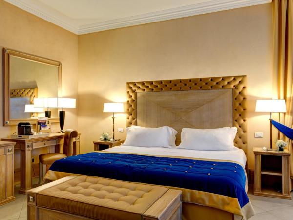 Villa Tolomei Hotel & Resort : photo 1 de la chambre chambre double deluxe
