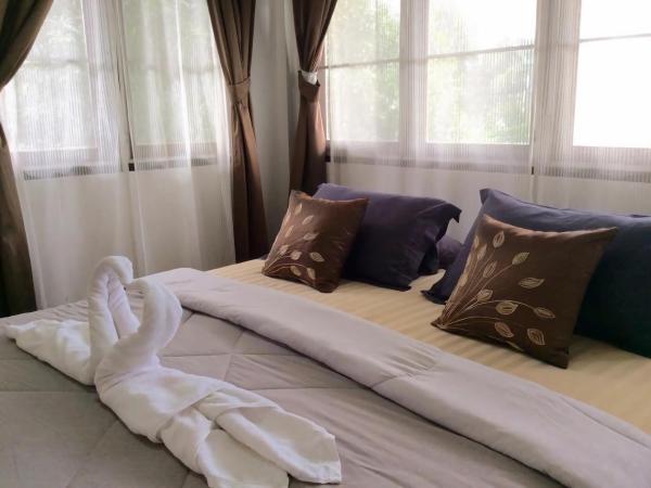 Naturbliss Resort Village : photo 1 de la chambre chambre double ou lits jumeaux avec salle de bains privative externe