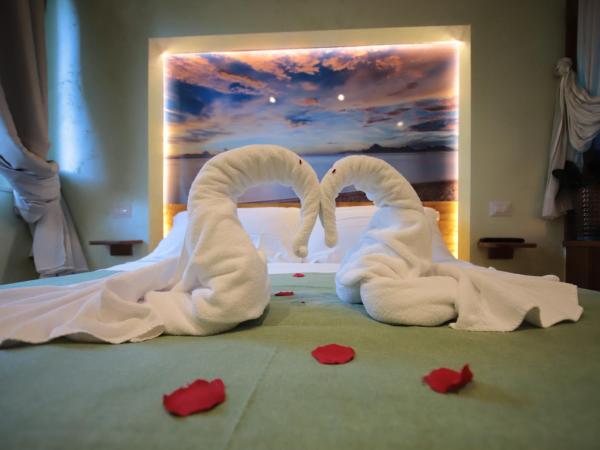 Dream & Relax Villa Fiore : photo 3 de la chambre suite avec baignoire spa