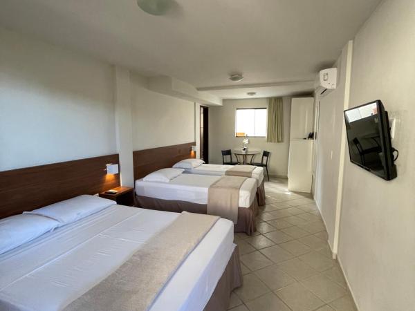 Pousada Laranja - Nova Administração : photo 2 de la chambre chambre triple standard