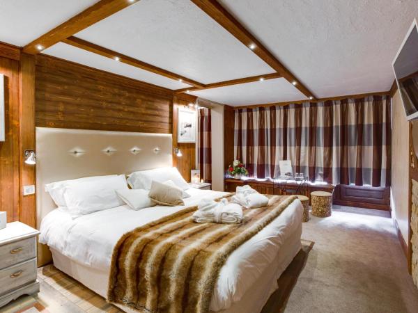 Hôtel Les Sherpas : photo 5 de la chambre chambre triple de luxe