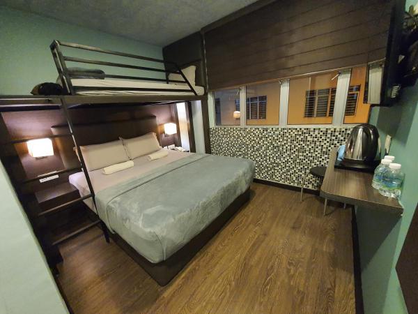 Cute Hotel & Dorms Ipoh : photo 3 de la chambre chambre triple