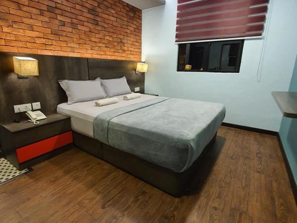 Cute Hotel & Dorms Ipoh : photo 2 de la chambre chambre lit queen-size 