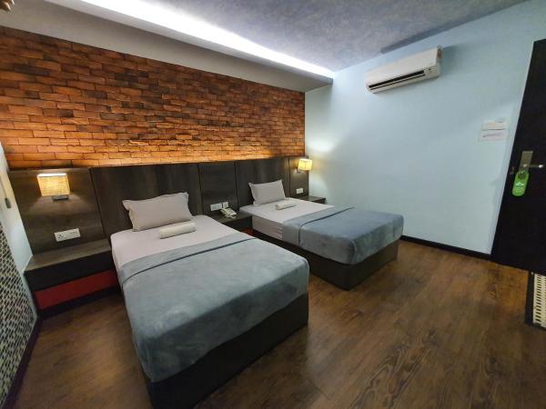 Cute Hotel & Dorms Ipoh : photo 1 de la chambre chambre lits jumeaux