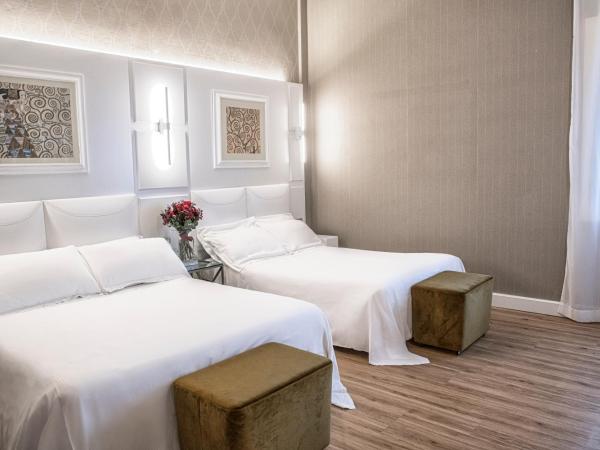 Villa Adriatica Ambienthotels : photo 1 de la chambre chambre quadruple supérieure