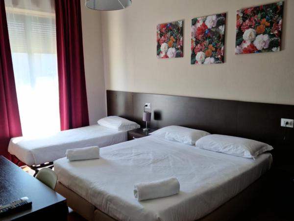Hotel di Porta Romana : photo 1 de la chambre chambre triple