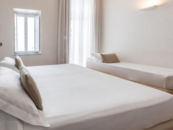 Hotel Piazza Bellini & Apartments : photo 3 de la chambre chambre triple standard