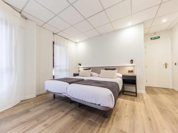 Auditorio Rooms Boutique Oviedo : photo 1 de la chambre chambre supérieure lit queen-size