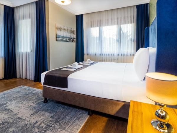 BayMari Suites Plus Florya : photo 8 de la chambre appartement 3 chambres deluxe avec balcon - vue sur piscine