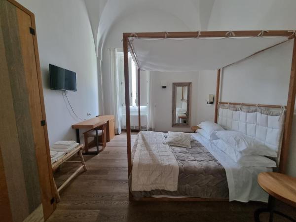 B&B Il Palazzotto Luxury Suites : photo 8 de la chambre chambre quadruple avec balcon 