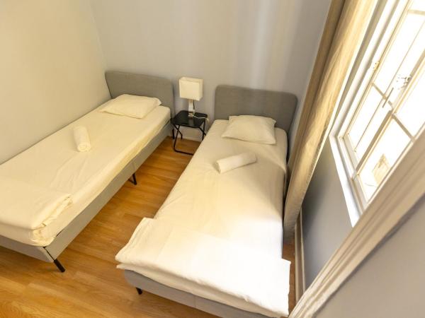 The Delight Hostel : photo 4 de la chambre chambre lits jumeaux avec salle de bains commune
