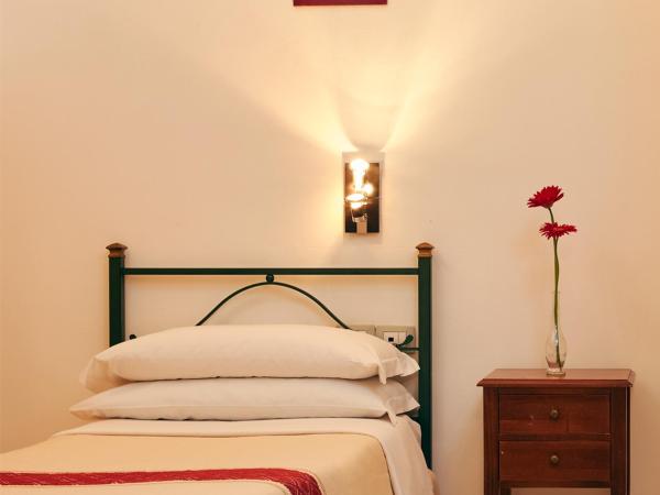 Cagliari Novecento : photo 2 de la chambre chambre simple