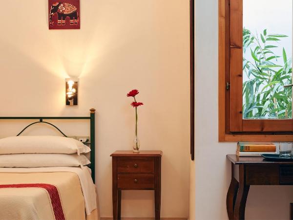 Cagliari Novecento : photo 4 de la chambre chambre simple