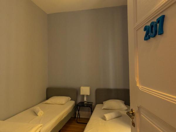 The Delight Hostel : photo 2 de la chambre chambre lits jumeaux avec salle de bains commune