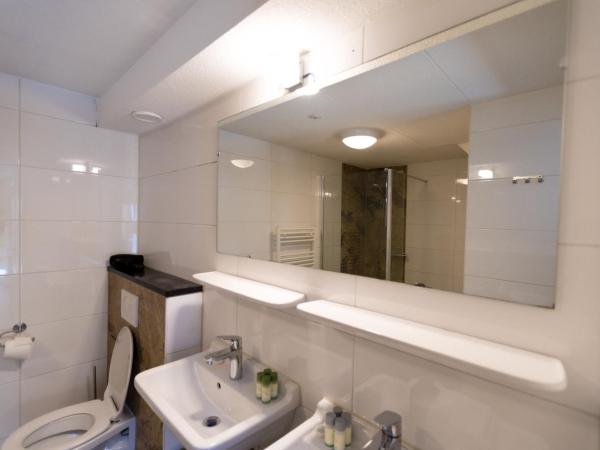 Plantage Garden Apartments : photo 5 de la chambre chambre quadruple en duplex