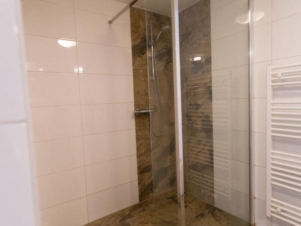 Plantage Garden Apartments : photo 8 de la chambre chambre quadruple en duplex