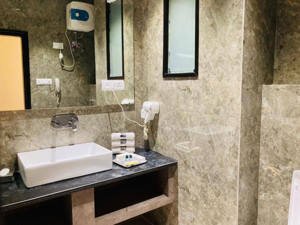 Hotel Aman Palace : photo 3 de la chambre suite lit king-size