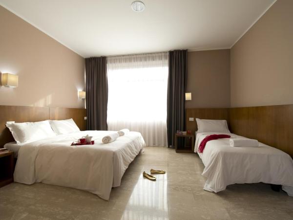 Oasi Village Hotel : photo 4 de la chambre chambre triple