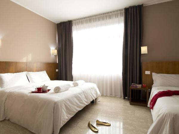 Oasi Village Hotel : photo 1 de la chambre chambre triple