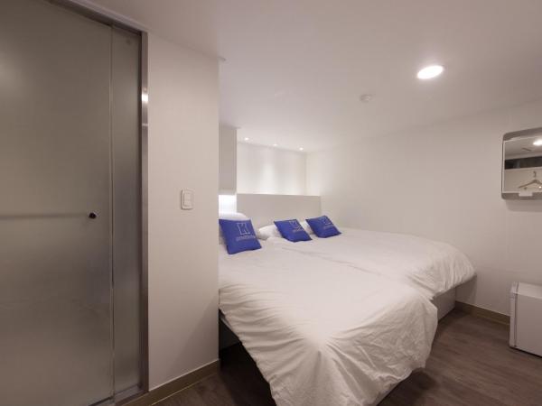 K-Guesthouse Myeongdong 1 : photo 5 de la chambre chambre triple Économique