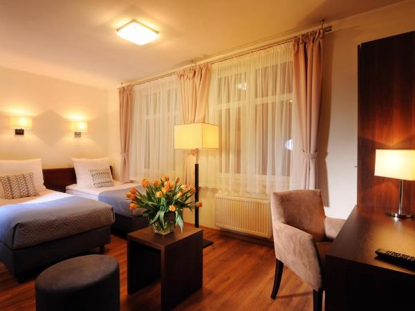 Armon Residence : photo 9 de la chambre chambre lits jumeaux