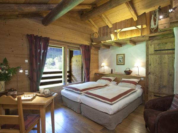 Chalet-Hôtel Les Fermes de Pierre & Anna : photo 3 de la chambre suite (4 adultes)