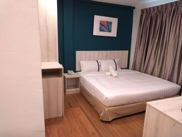 Smile Hotel Cheras Taman Segar : photo 2 de la chambre chambre triple