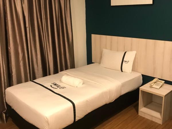 Smile Hotel Cheras Taman Segar : photo 1 de la chambre chambre simple