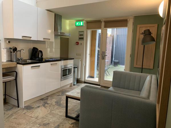 Plantage Garden Apartments : photo 6 de la chambre chambre triple en duplex 