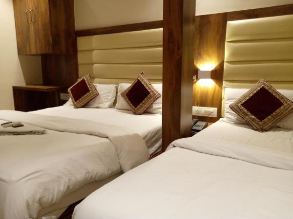 Hotel Adams Inn Near Mumbai Airport : photo 1 de la chambre chambre triple classique