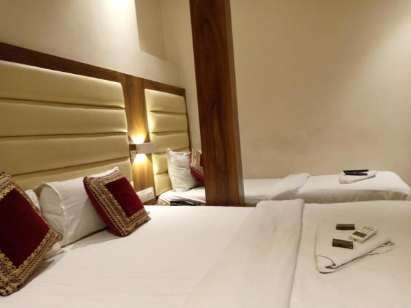 Hotel Adams Inn Near Mumbai Airport : photo 2 de la chambre chambre triple classique