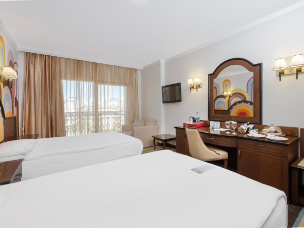 Megasaray Westbeach Antalya : photo 4 de la chambre chambre double ou lits jumeaux deluxe - vue sur ville 
