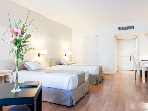 Loi Suites Recoleta Hotel : photo 1 de la chambre chambre lits jumeaux