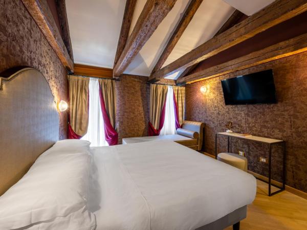 Hotel Paganelli : photo 4 de la chambre chambre triple