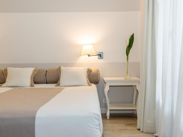 Loi Suites Recoleta Hotel : photo 5 de la chambre chambre familiale supérieure