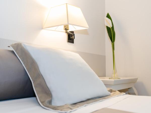 Loi Suites Recoleta Hotel : photo 9 de la chambre chambre familiale supérieure