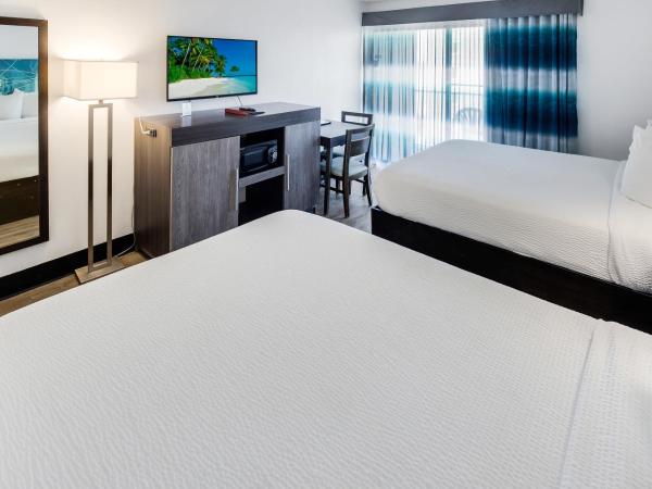 Tropical Seas Hotel : photo 3 de la chambre chambre avec 2 lits queen-size - vue partielle sur océan