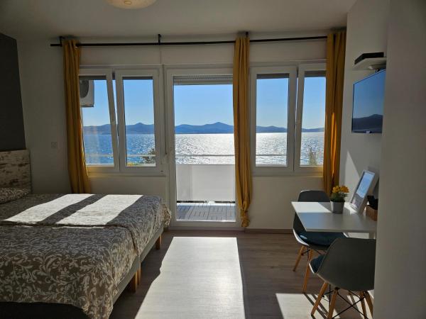 Nora Rooms : photo 3 de la chambre chambre double ou lits jumeaux deluxe - vue sur mer