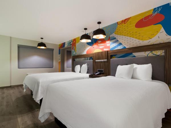 Signature Inn Houston Galleria : photo 4 de la chambre suite lit queen-size