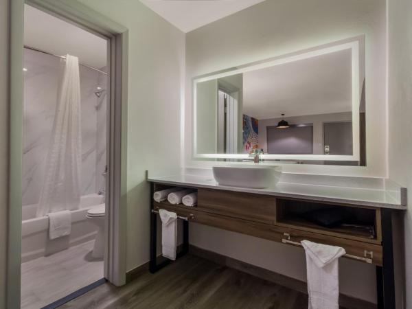 Signature Inn Houston Galleria : photo 6 de la chambre suite lit king-size