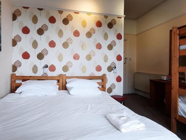 Dolphins Hotel : photo 1 de la chambre chambre quadruple