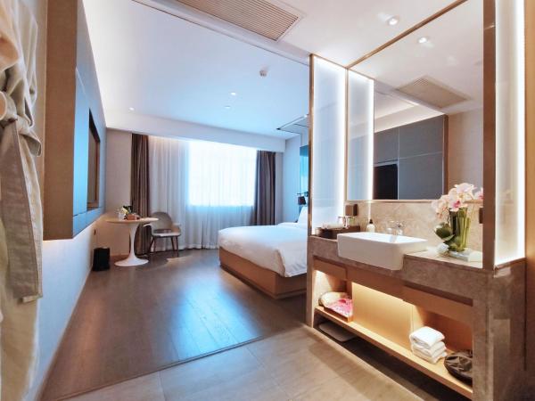 Paco Hotel Guangzhou South Railway Station Panyu Changlong Branch : photo 1 de la chambre chambre supérieure lit queen-size