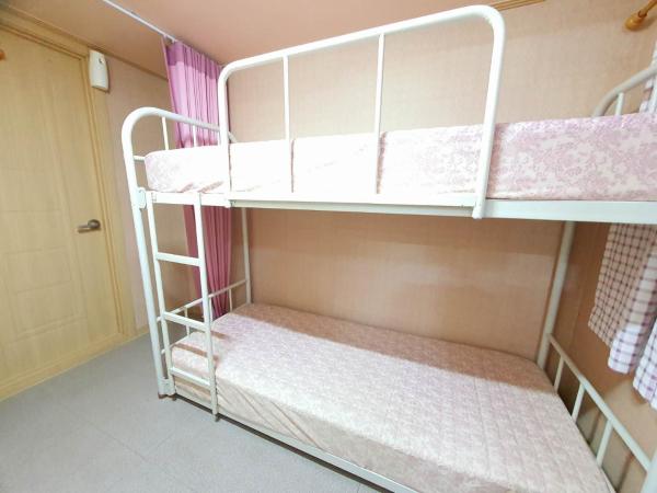 Happy Garden Guesthouse : photo 4 de la chambre lit simple dans dortoir pour femmes