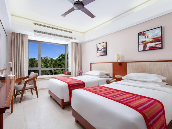 Sanya Seacube Holiday Hotel : photo 7 de la chambre chambre lit king-size ou lits jumeaux supérieure - vue sur jardin