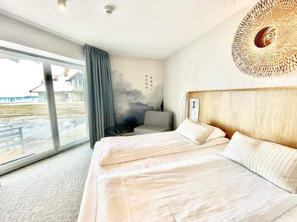 Hotel Zhong Hua : photo 2 de la chambre chambre double deluxe - vue sur mer