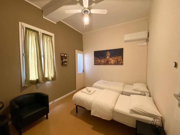 Maison Sarraj Affittacamere : photo 3 de la chambre chambre double ou lits jumeaux avec salle de bains privative