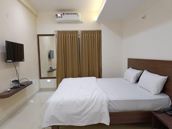 RK COMFORTS : photo 3 de la chambre chambre double ou lits jumeaux deluxe avec balcon